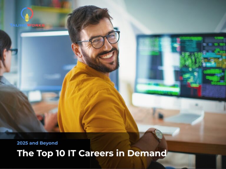 IT tech guy happy looking back sitting in front of this computer